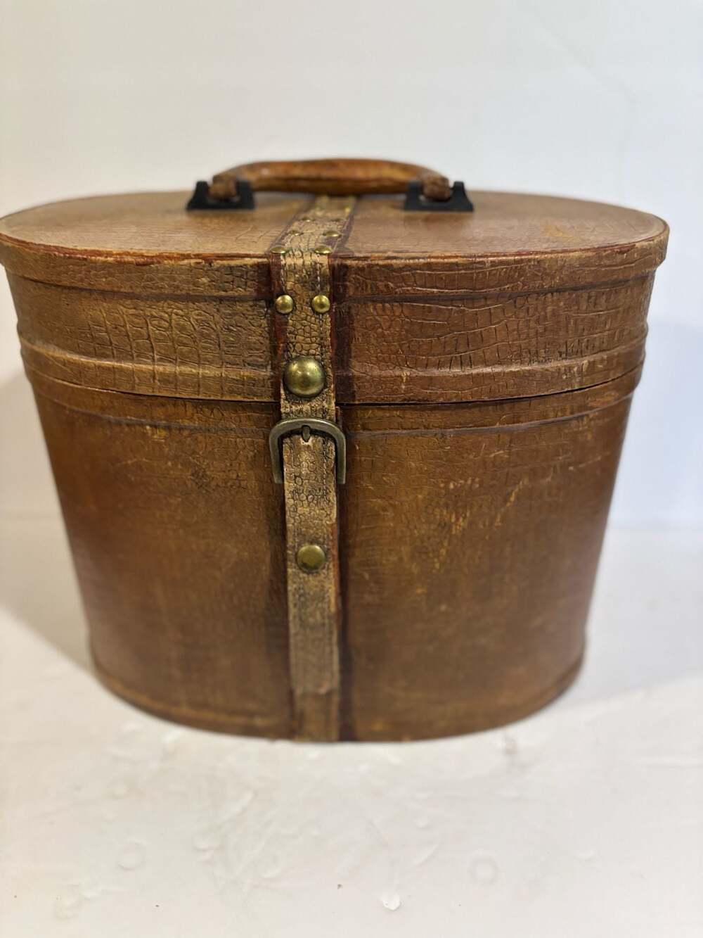 Vintage Oval Leather Hat Box with Brass Buckle and Burgundy Lining